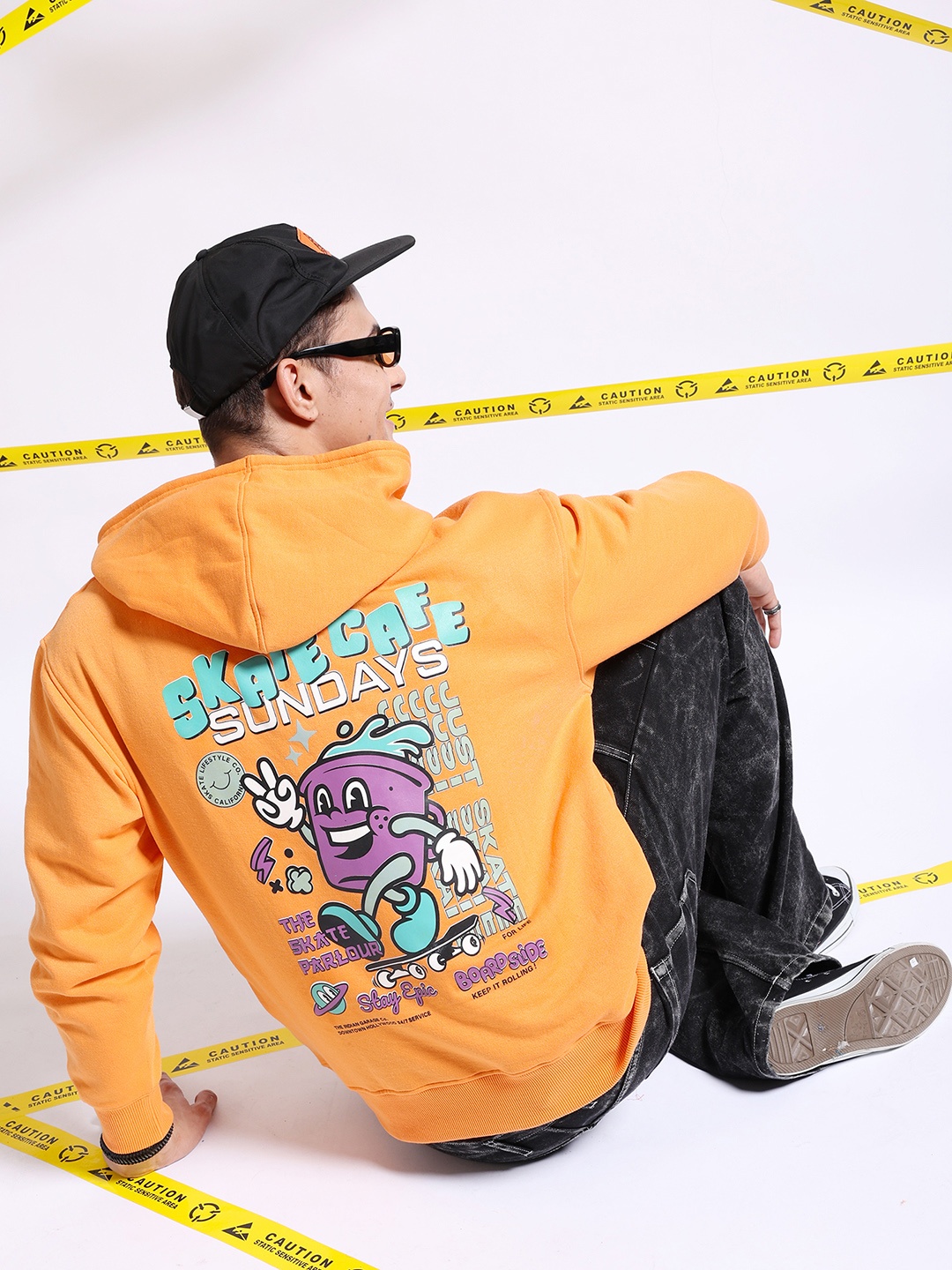 The Indian Garage Co Graphic Back Printed Hooded Oversized Pullover Sweatshirt, Orange
The Indian Garage Co Graphic Back Printed Hooded Oversized Pullover Sweatshirt, Orange