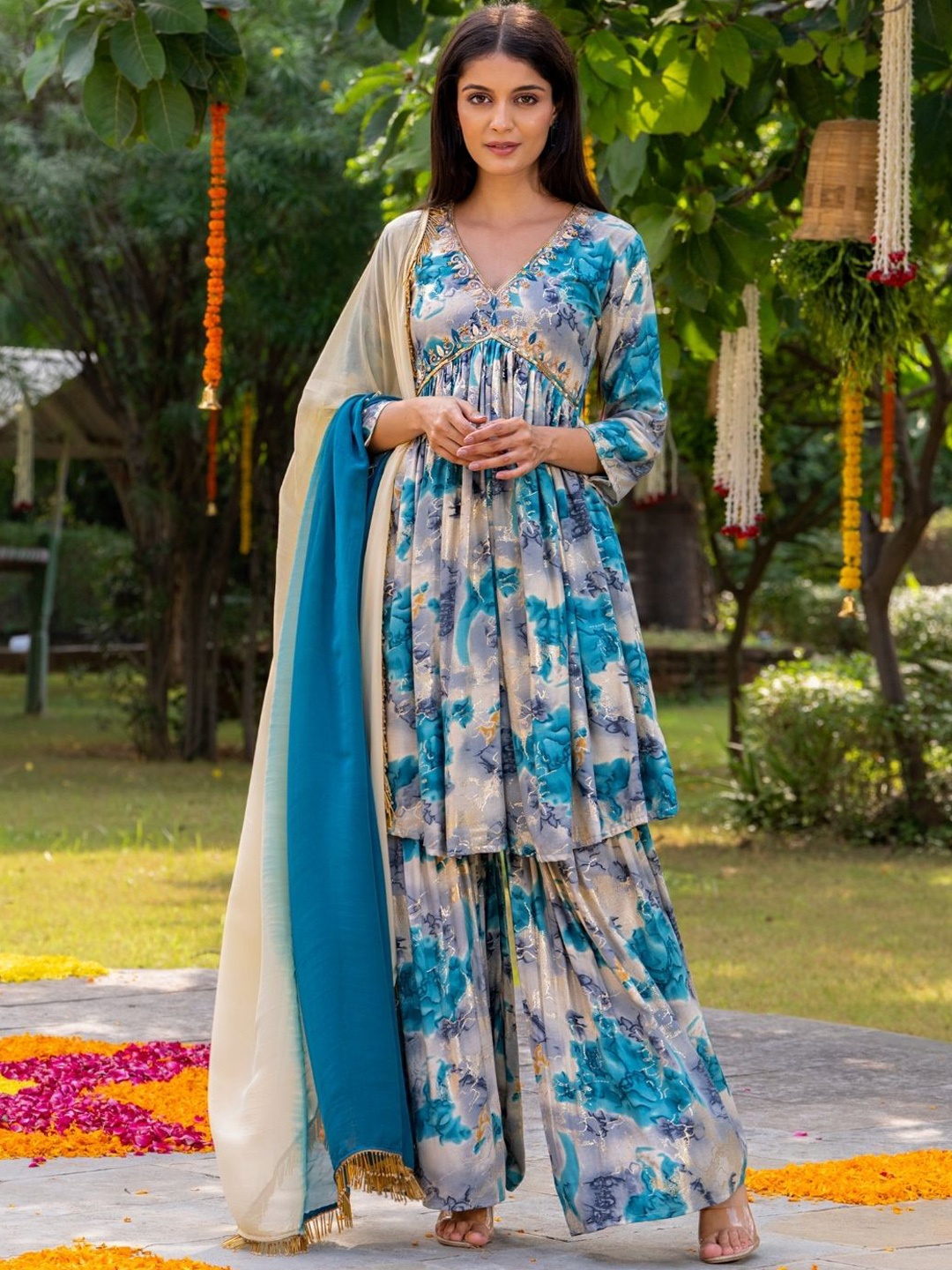 HOUSE OF JAMOTI Floral Printed Aari Work Anarkali Kurta With Sharara & Dupatta, Turquoise blue
HOUSE OF JAMOTI Floral Printed Aari Work Anarkali Kurta With Sharara & Dupatta, Turquoise blue