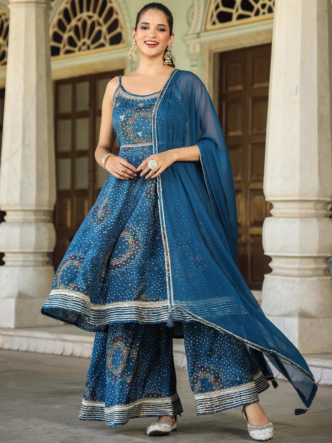 SCAKHI Bandhani Printed Shoulder Straps Mirror Work Anarkali Kurta With Sharara & Dupatta, Navy blue
SCAKHI Bandhani Printed Shoulder Straps Mirror Work Anarkali Kurta With Sharara & Dupatta, Navy blue