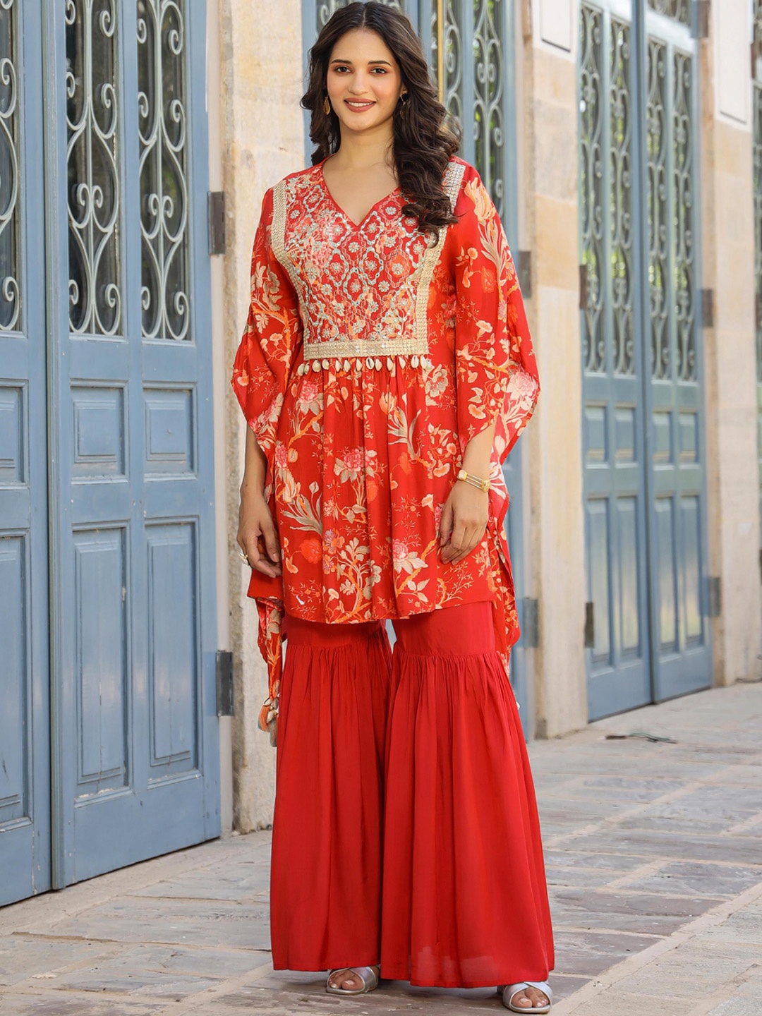 SCAKHI Floral Printed V-Neck Pleated Mirror Work Kaftan Kurta With Sharara, Orange
SCAKHI Floral Printed V-Neck Pleated Mirror Work Kaftan Kurta With Sharara, Orange