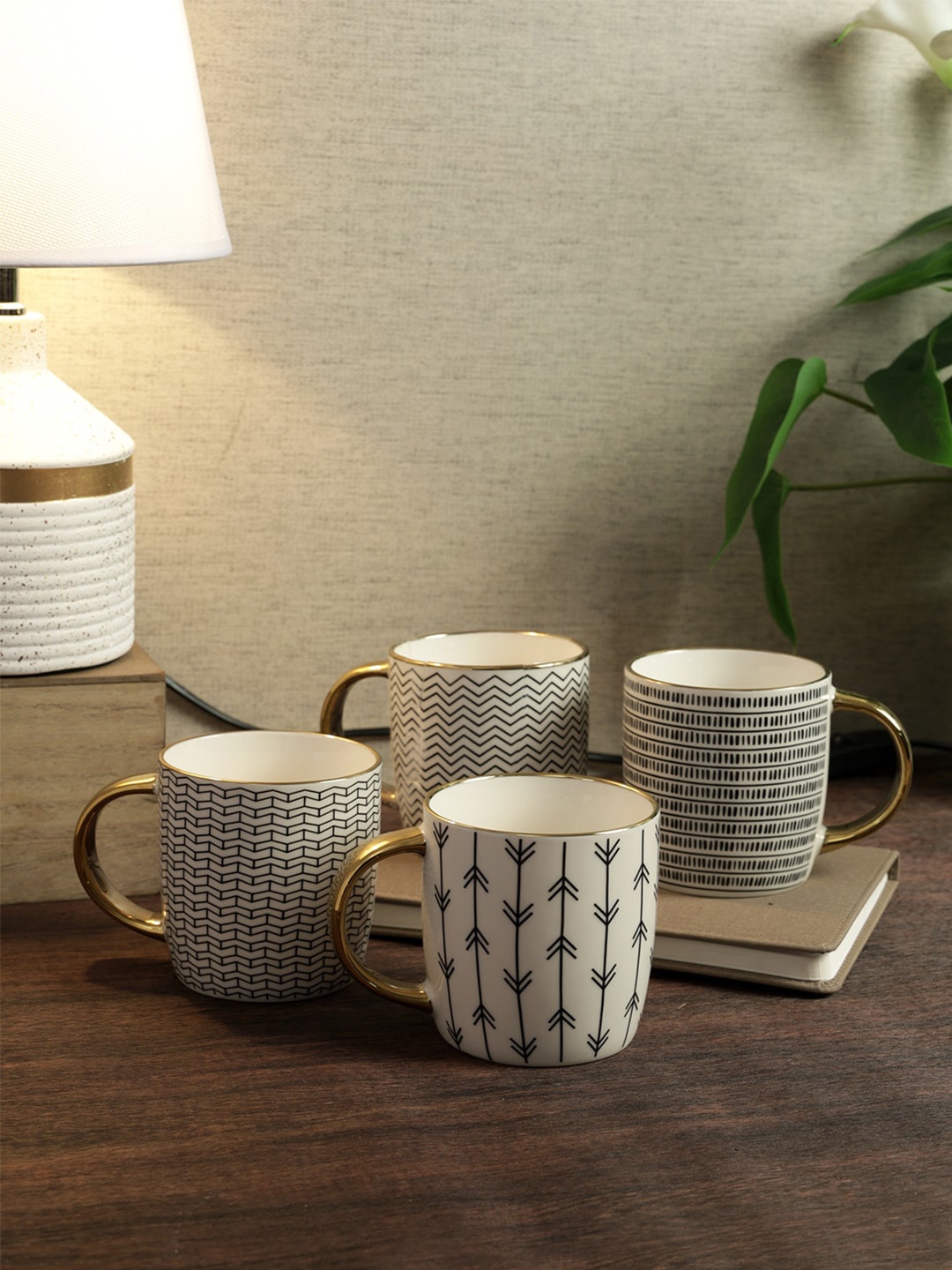 House Of Accessories Blue 4 Pcs Ethnic Motifs Printed Bone China Glossy Mugs-360 ML Each
House Of Accessories Blue 4 Pcs Ethnic Motifs Printed Bone China Glossy Mugs-360 ML Each