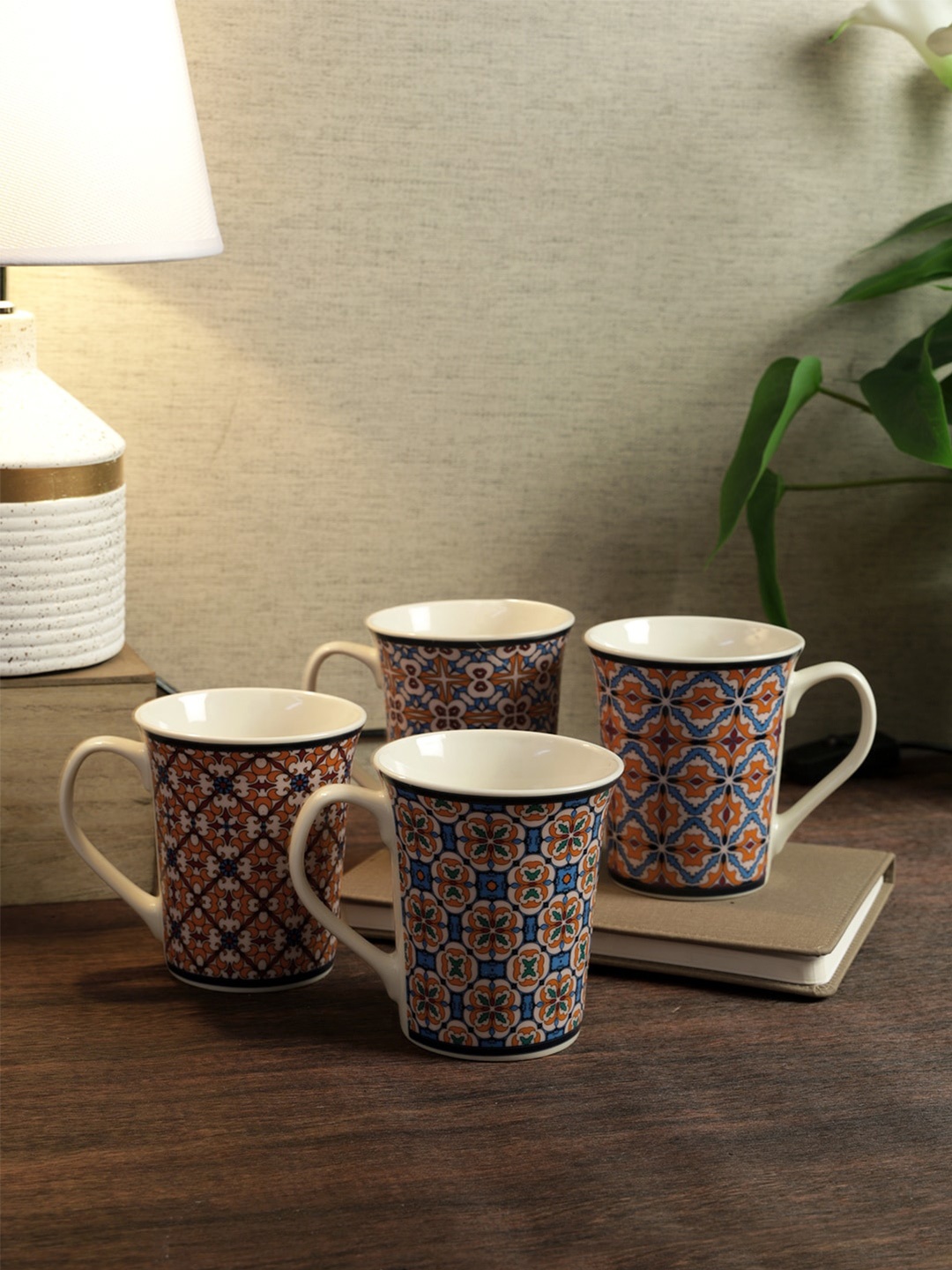 House Of Accessories White & Red 4 Pieces Ethnic Printed Bone China Glossy Mugs 350 ml
House Of Accessories White & Red 4 Pieces Ethnic Printed Bone China Glossy Mugs 350 ml
