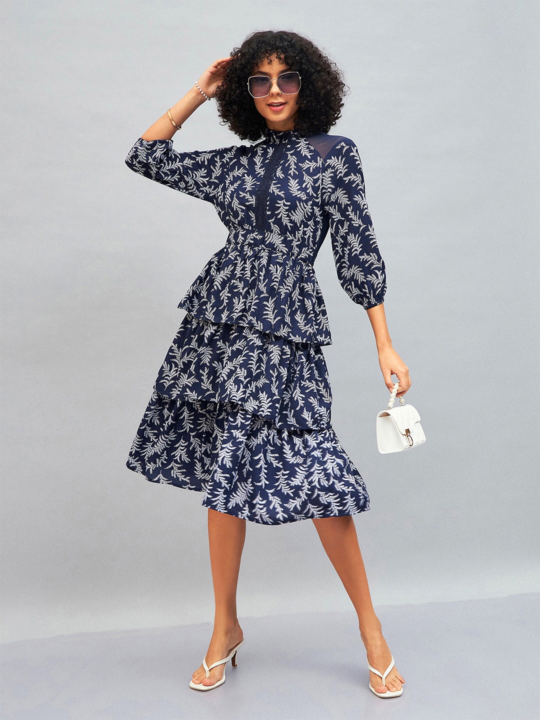 SASSAFRAS Navy Blue Floral Printed High Neck Cuffed Sleeves Layered Fit & Flare Midi Dress
SASSAFRAS Navy Blue Floral Printed High Neck Cuffed Sleeves Layered Fit & Flare Midi Dress