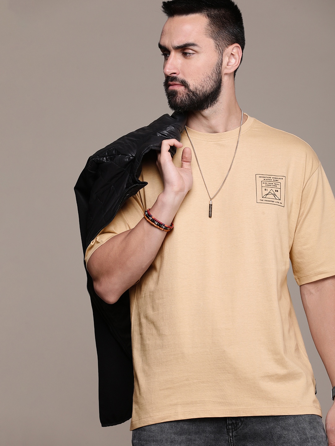 The Roadster Life Co. Printed Drop-Shoulder Sleeves Pure Cotton Relaxed Fit T-shirt, Beige
The Roadster Life Co. Printed Drop-Shoulder Sleeves Pure Cotton Relaxed Fit T-shirt, Beige