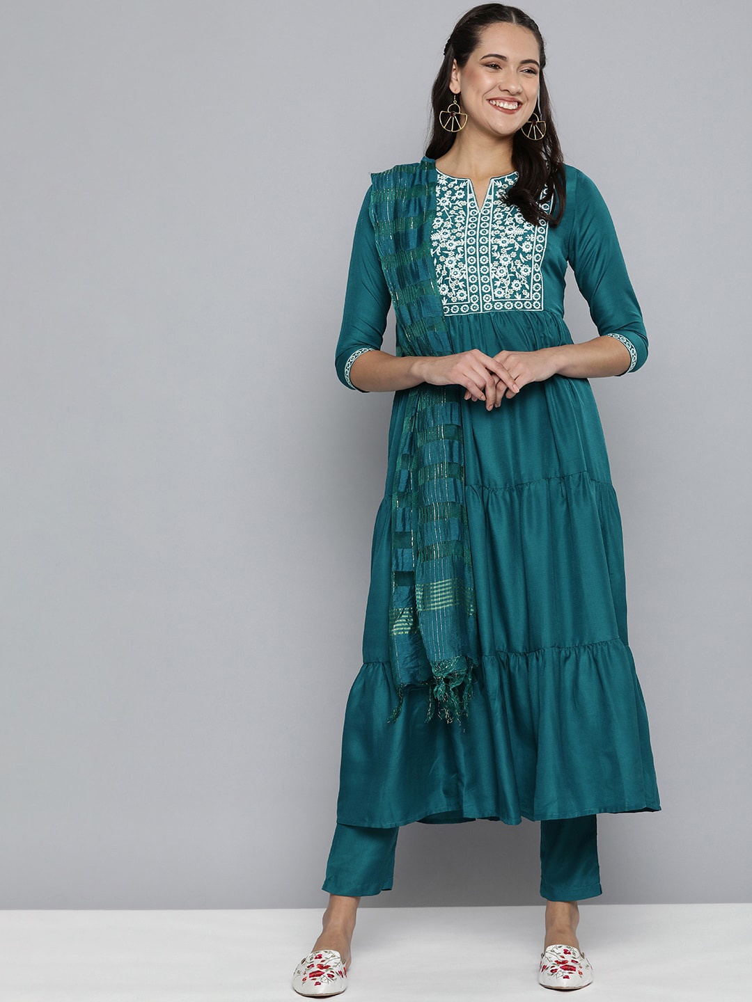 KALINI Floral Yoke Design Thread Work Tiered Anarkali Kurta with Trousers & Dupatta, Teal
KALINI Floral Yoke Design Thread Work Tiered Anarkali Kurta with Trousers & Dupatta, Teal