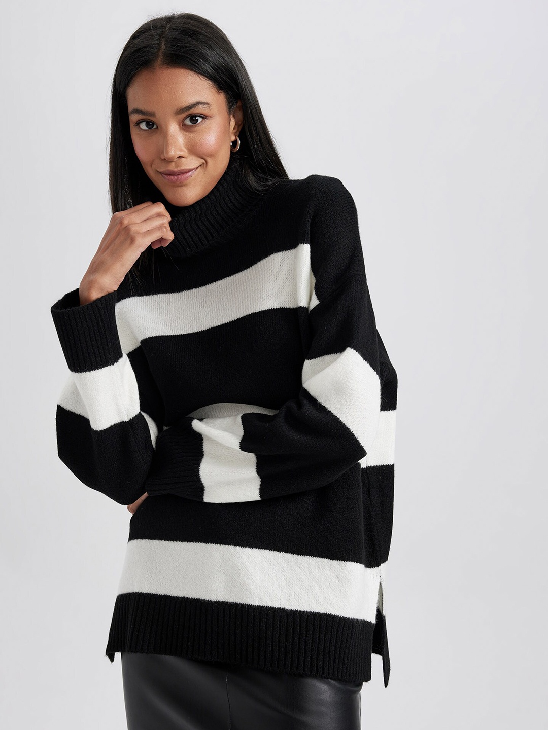 DeFacto Striped Turtle Neck Drop-Shoulder Sleeves Oversized Longline Pullover Sweater, Black
DeFacto Striped Turtle Neck Drop-Shoulder Sleeves Oversized Longline Pullover Sweater, Black