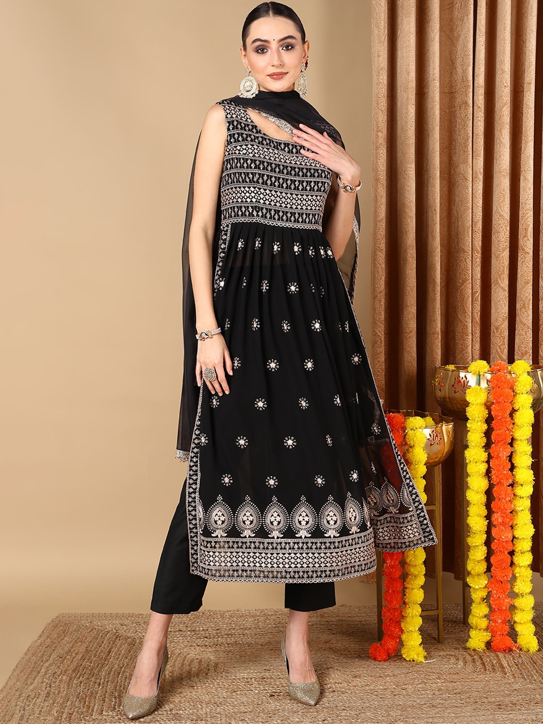 AHIKA Black Ethnic Motifs Embroidered Thread Work A-Line Kurta & Trousers With Dupatta
AHIKA Black Ethnic Motifs Embroidered Thread Work A-Line Kurta & Trousers With Dupatta
