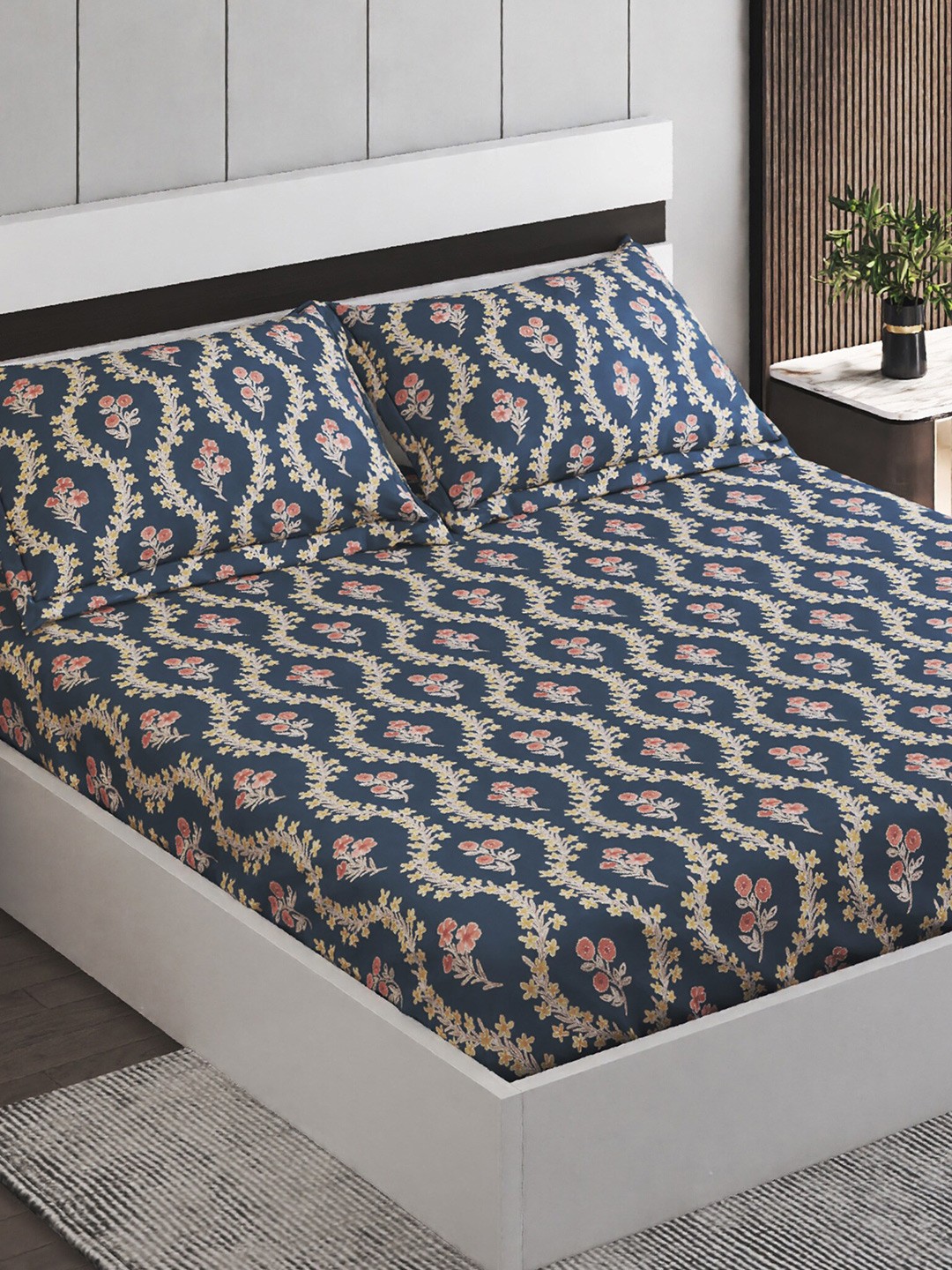 Home Centre Moments Blue & Pink Floral Cotton 132 TC Queen Bedsheet with 2 Pillow Covers
Home Centre Moments Blue & Pink Floral Cotton 132 TC Queen Bedsheet with 2 Pillow Covers