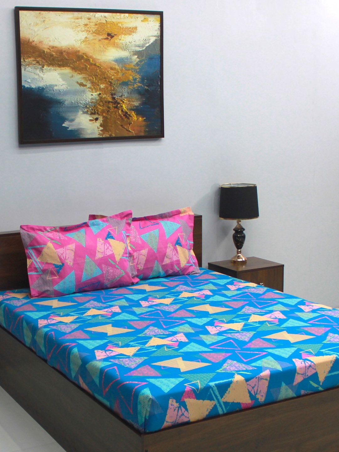 BOMBAY DYEING Blue & Pink Geometric Cotton 104 TC Queen Bedsheet with 2 Pillow Covers
BOMBAY DYEING Blue & Pink Geometric Cotton 104 TC Queen Bedsheet with 2 Pillow Covers