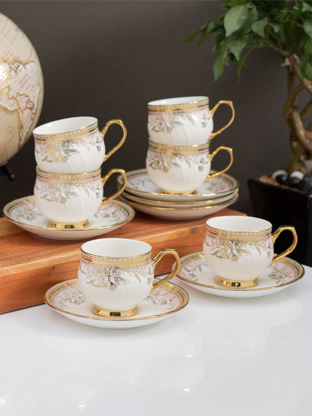 CLAY CRAFT White & Gold-Toned 12 Pieces Printed Ceramic Glossy Cups & Saucers 180 ml
CLAY CRAFT White & Gold-Toned 12 Pieces Printed Ceramic Glossy Cups & Saucers 180 ml