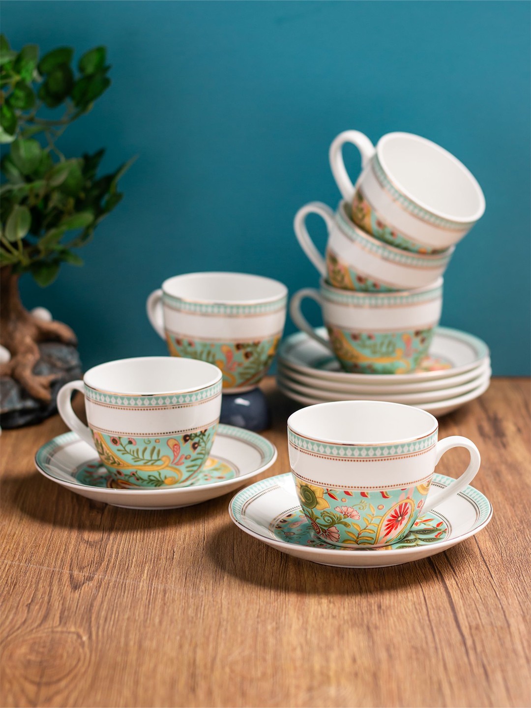 CLAY CRAFT Premium White 12 Pcs Floral Printed Ceramic Glossy Cups & Saucers - 180 ml each
CLAY CRAFT Premium White 12 Pcs Floral Printed Ceramic Glossy Cups & Saucers - 180 ml each