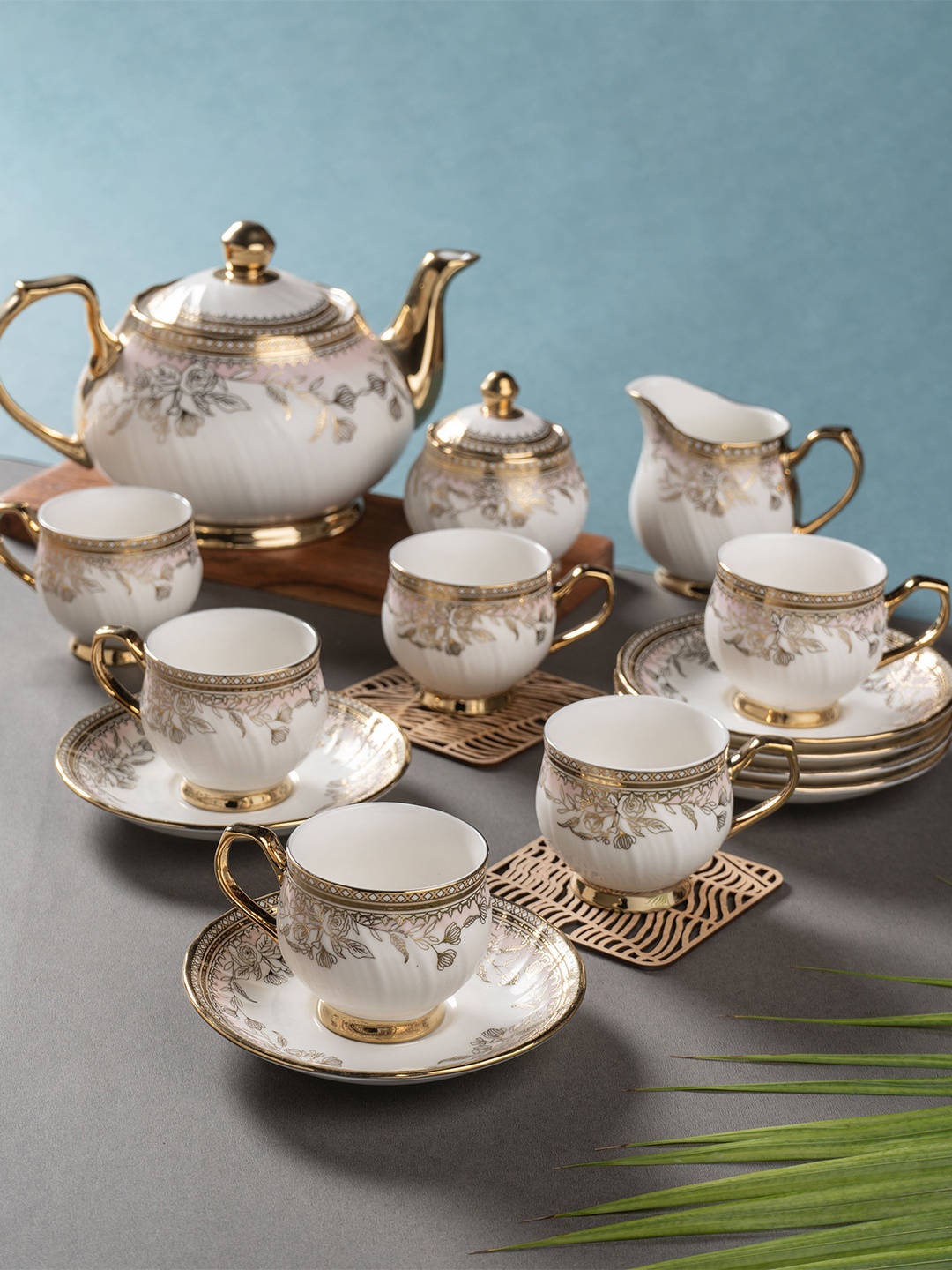 CLAY CRAFT KARINA White & Gold-Toned 15 Pieces Floral Printed Ceramic Glossy Kettle Set
CLAY CRAFT KARINA White & Gold-Toned 15 Pieces Floral Printed Ceramic Glossy Kettle Set