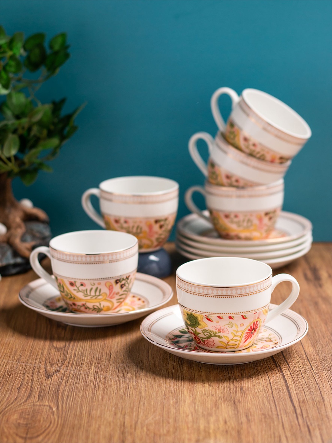 CLAY CRAFT White & Red 12 Pieces Floral Printed Ceramic Glossy Cups and Saucers 180 ml
CLAY CRAFT White & Red 12 Pieces Floral Printed Ceramic Glossy Cups and Saucers 180 ml