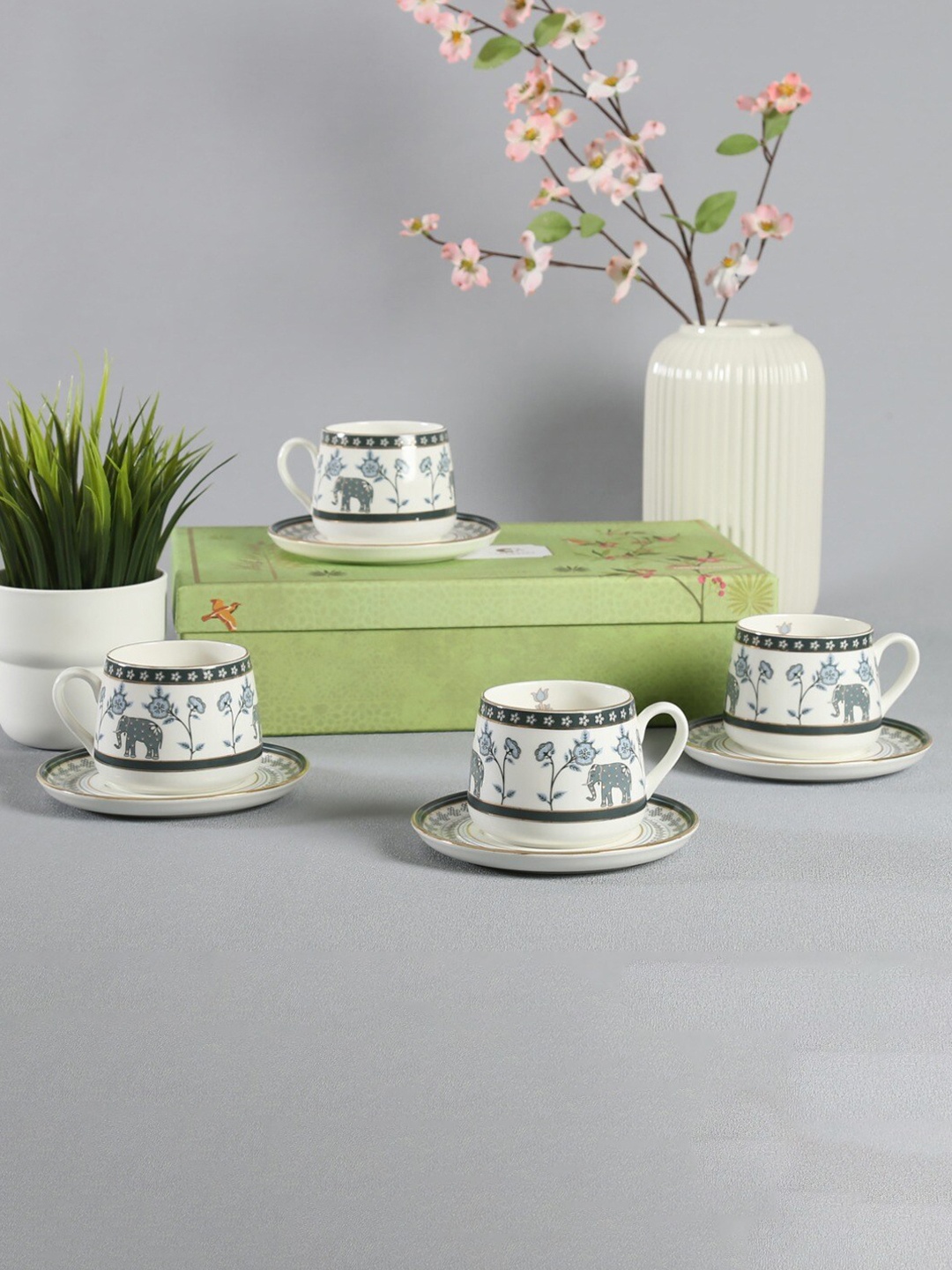 India Circus 8 Pcs White & Blue Ethnic Motifs Bone China Cups and Saucers - 220 ML Each
India Circus 8 Pcs White & Blue Ethnic Motifs Bone China Cups and Saucers - 220 ML Each