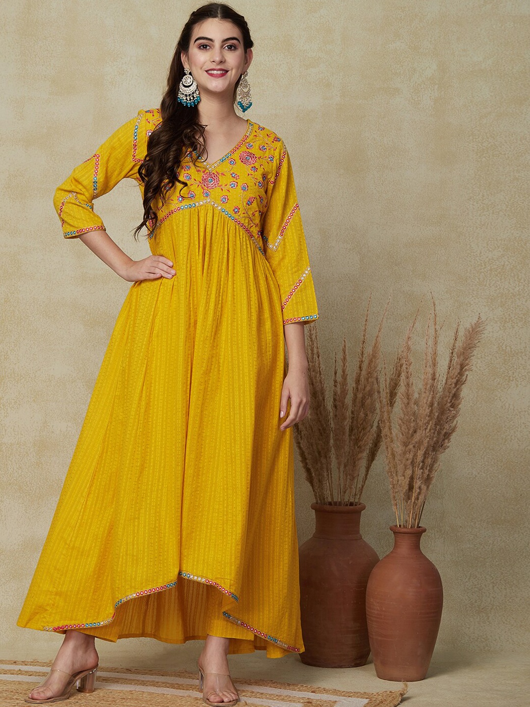 FASHOR Floral Embroidered Empire Mirror Work Pure Cotton A-line Kurta With Trousers, Yellow
FASHOR Floral Embroidered Empire Mirror Work Pure Cotton A-line Kurta With Trousers, Yellow