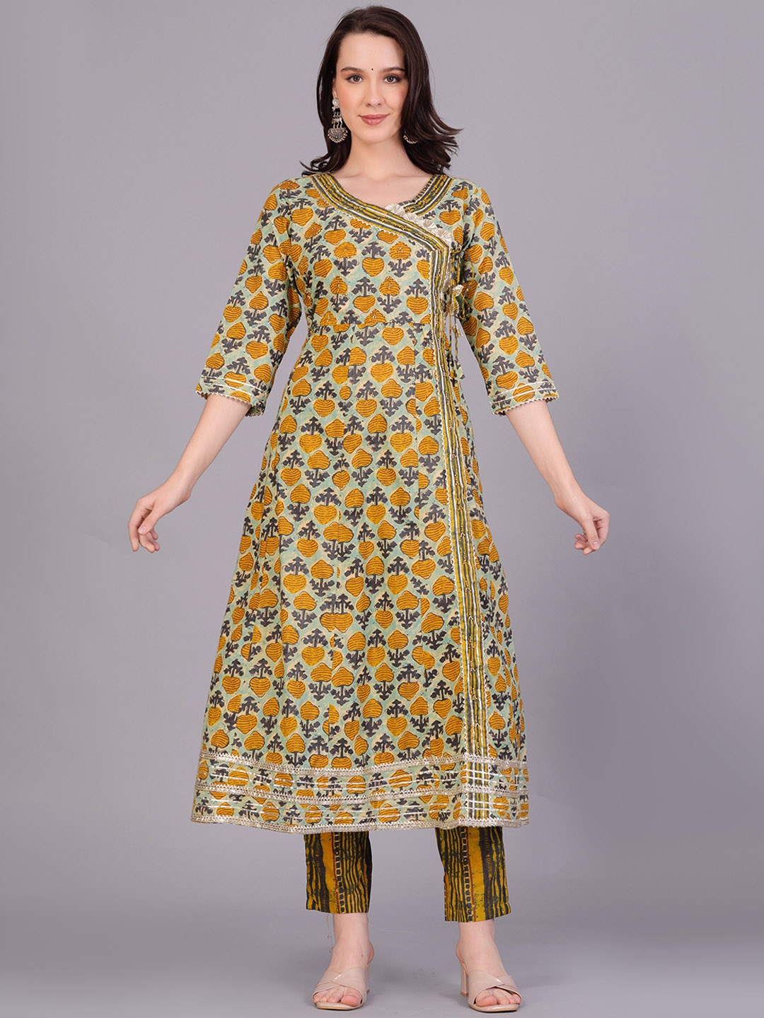 KALINI Ethnic Motifs Printed Angrakha Cotton Straight Kurta & Trousers With Dupatta, Yellow
KALINI Ethnic Motifs Printed Angrakha Cotton Straight Kurta & Trousers With Dupatta, Yellow