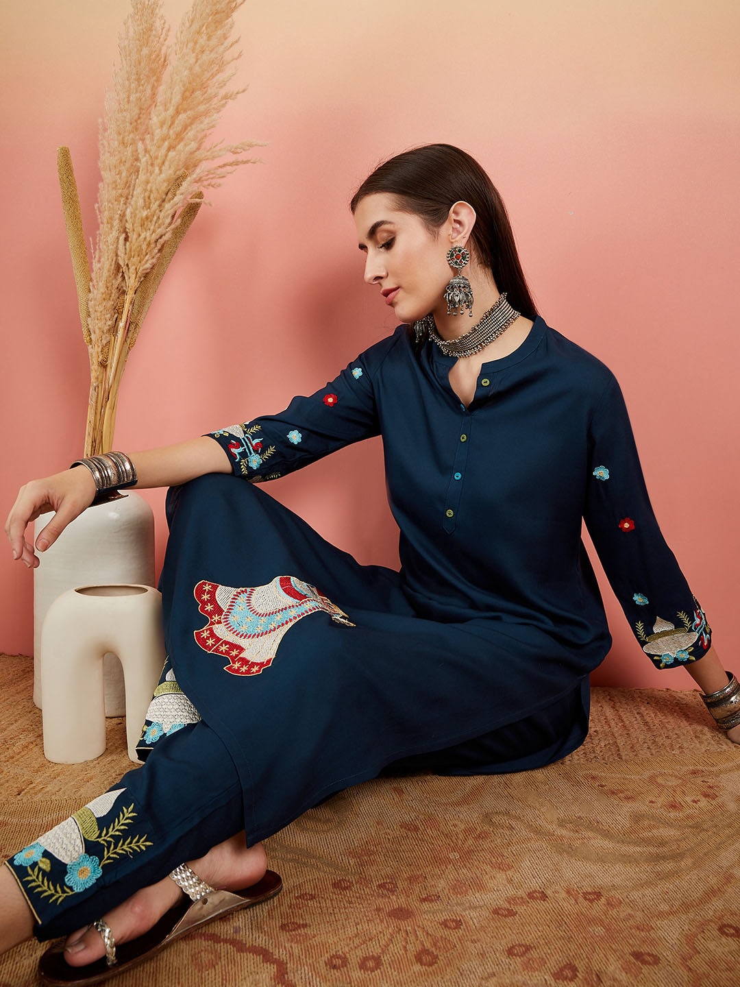 Sangria Navy Blue Ethnic Motifs Embroidered Mandarin Collar Straight Kurta & Trousers
Sangria Navy Blue Ethnic Motifs Embroidered Mandarin Collar Straight Kurta & Trousers