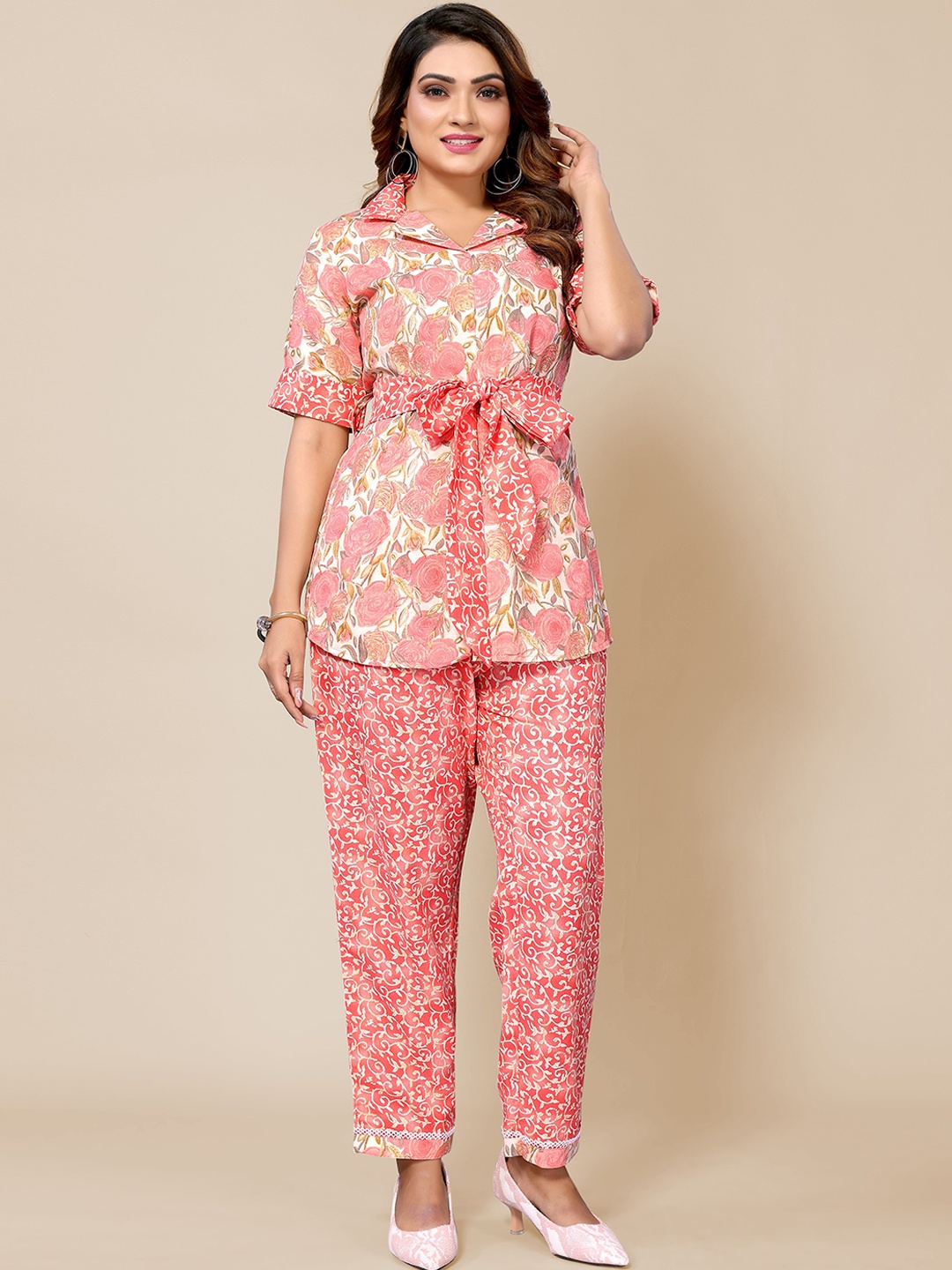 TITANIUM SILK INDUSTRIES PVT. LTD. Floral Printed Cuban Collar Tie Up Tunic & Trousers, Pink
TITANIUM SILK INDUSTRIES PVT. LTD. Floral Printed Cuban Collar Tie Up Tunic & Trousers, Pink
