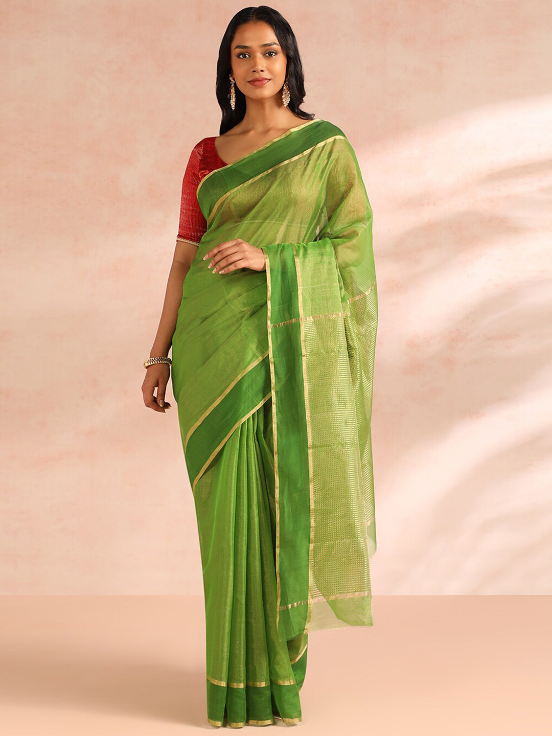 TaneiraStriped Zari Silk Cotton Chanderi Saree, Green
TaneiraStriped Zari Silk Cotton Chanderi Saree, Green