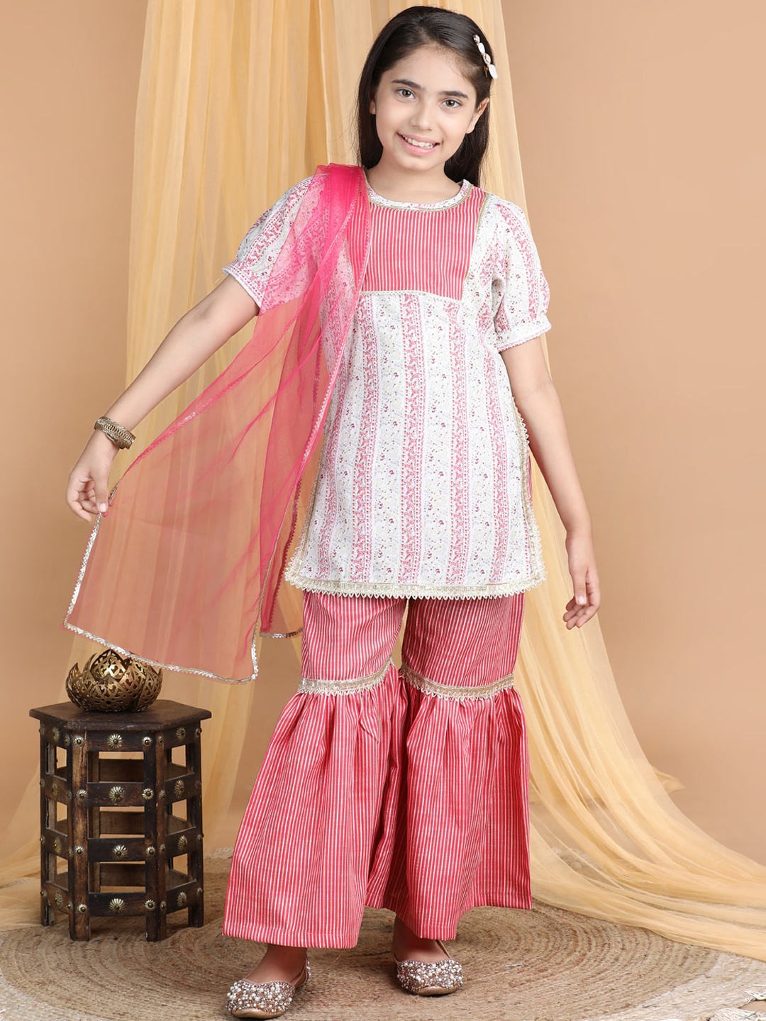 Cutiekins Girls Ethnic Motifs Printed Gotta Patti Straight Kurti with Sharara & Dupatta, Off white
Cutiekins Girls Ethnic Motifs Printed Gotta Patti Straight Kurti with Sharara & Dupatta, Off white