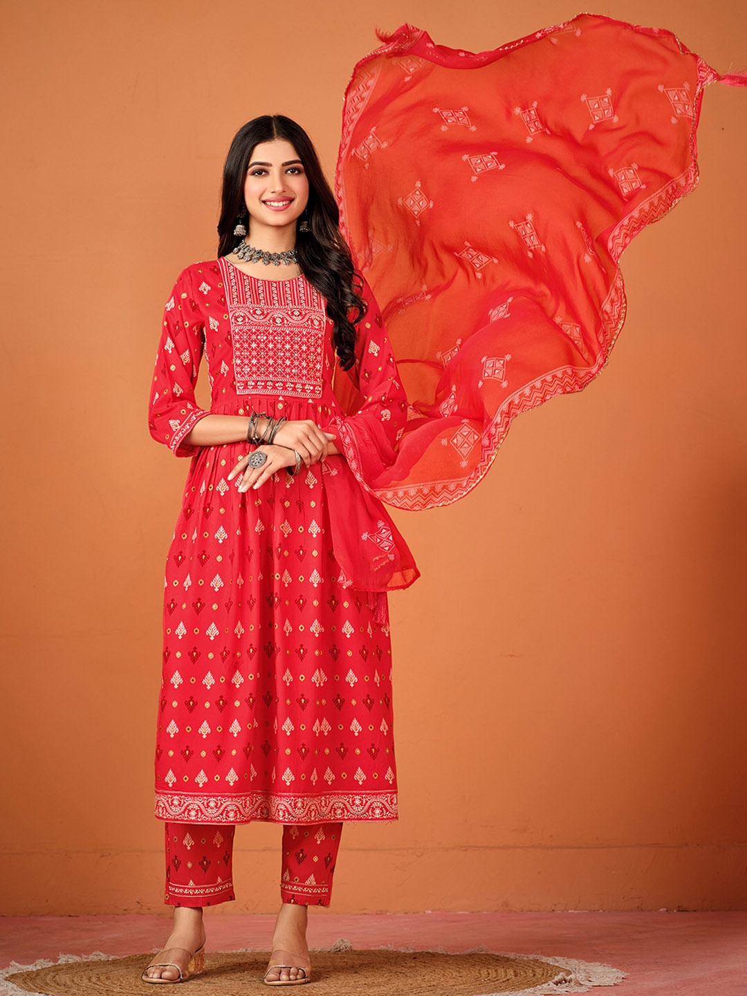 Sangria Red Ethnic Motifs Printed Thread Work Sequinned Kurta & Trousers With Dupatta
Sangria Red Ethnic Motifs Printed Thread Work Sequinned Kurta & Trousers With Dupatta