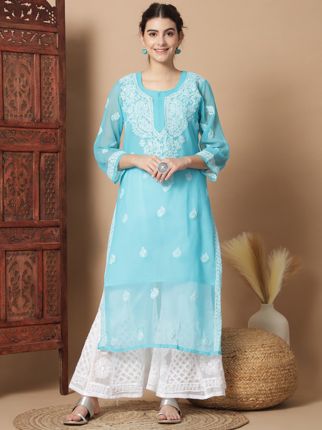 Ethnava Ethnic Motifs Embroidered Regular Georgette Chikankari Kurta & Sharara With Slip, Blue
Ethnava Ethnic Motifs Embroidered Regular Georgette Chikankari Kurta & Sharara With Slip, Blue