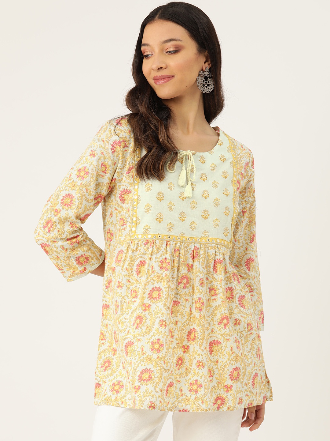 Rue Collection Floral Printed Mirror Work Pure Cotton Mirror Work Pleated Kurti, Yellow
Rue Collection Floral Printed Mirror Work Pure Cotton Mirror Work Pleated Kurti, Yellow