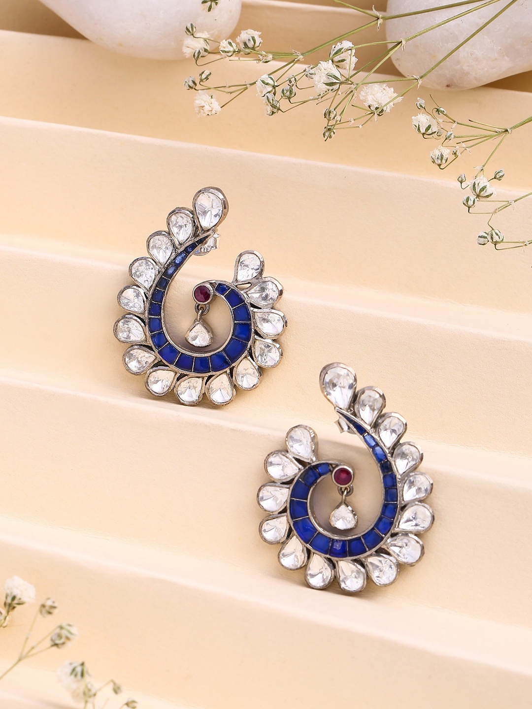 Kicky And Perky Silver Plated Stone Studded Peacock Shaped Sterling Silver Drop Earrings
Kicky And Perky Silver Plated Stone Studded Peacock Shaped Sterling Silver Drop Earrings