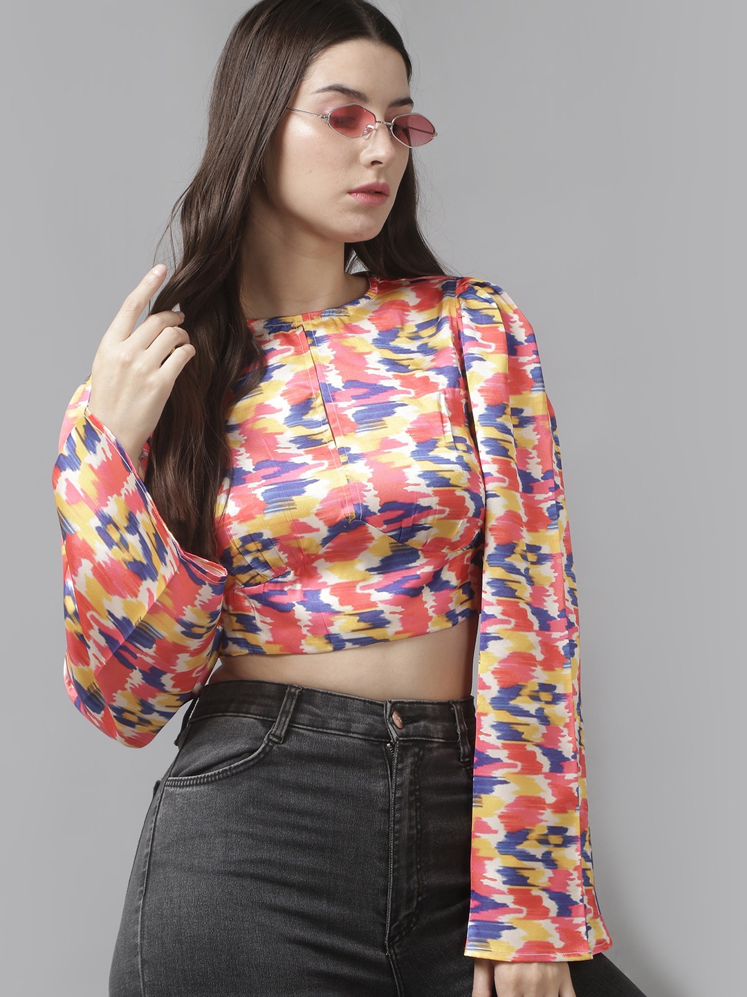 Roadster Red Abstract Printed Keyhole Neck Bell Sleeves Tie-Ups Styled Back Crop Top
Roadster Red Abstract Printed Keyhole Neck Bell Sleeves Tie-Ups Styled Back Crop Top