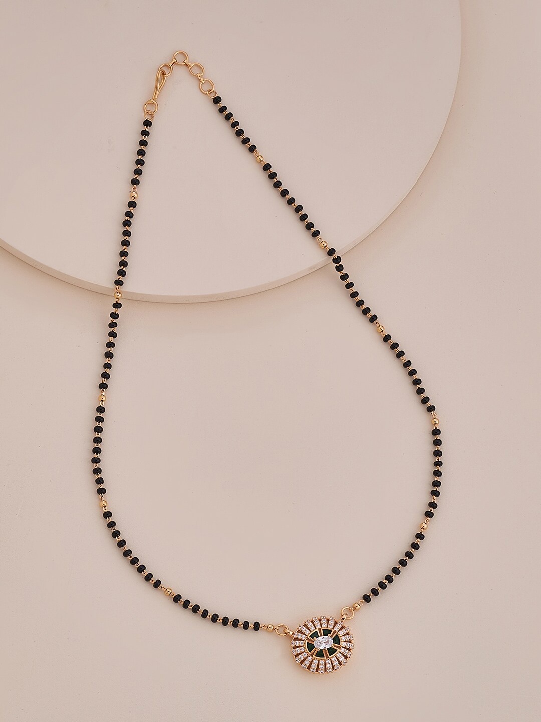 Kushal's Fashion Jewellery Gold-Plated CZ Stone-Studded & Beaded Mangalsutra, Rose gold
Kushal's Fashion Jewellery Gold-Plated CZ Stone-Studded & Beaded Mangalsutra, Rose gold