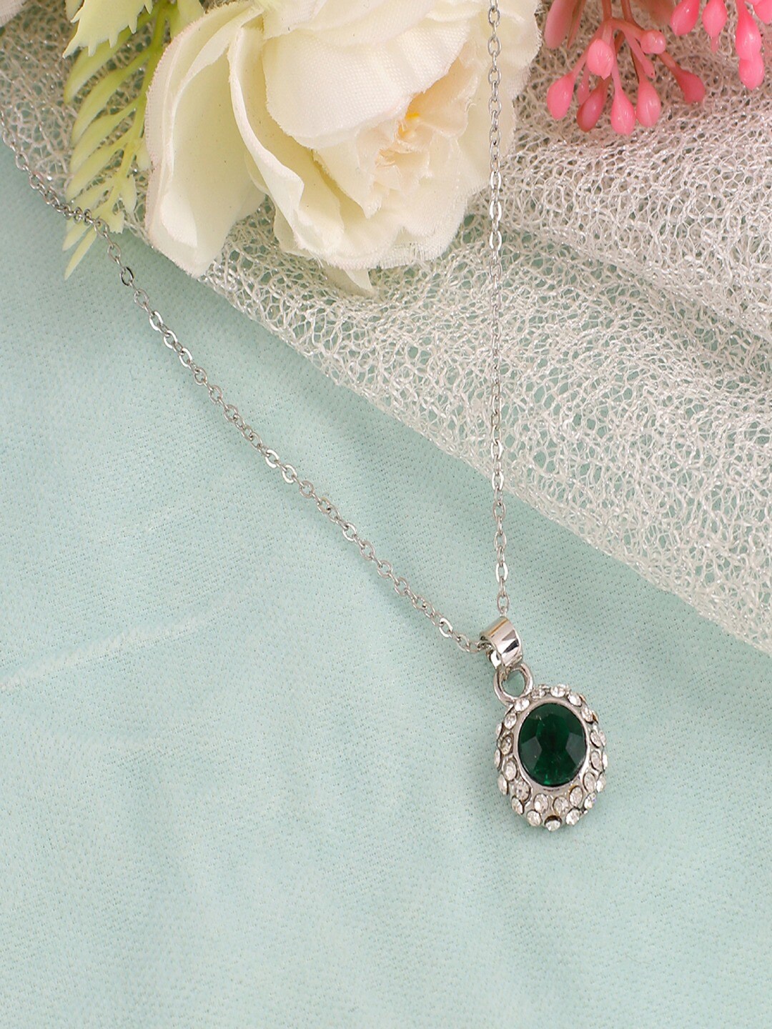 UNIVERSITY TRENDZ Silver Plated Crystal Studded Oval Shape Pendant With Chain
UNIVERSITY TRENDZ Silver Plated Crystal Studded Oval Shape Pendant With Chain