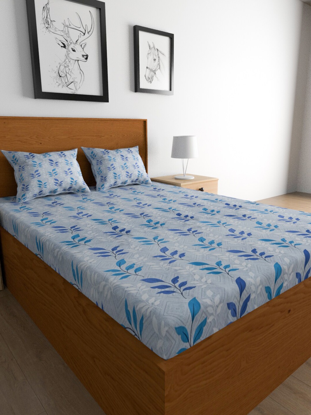 TEAL BY CHUMBAK Blue & White Printed Cotton 144 TC Queen Bedsheet with 2 Pillow Covers
TEAL BY CHUMBAK Blue & White Printed Cotton 144 TC Queen Bedsheet with 2 Pillow Covers