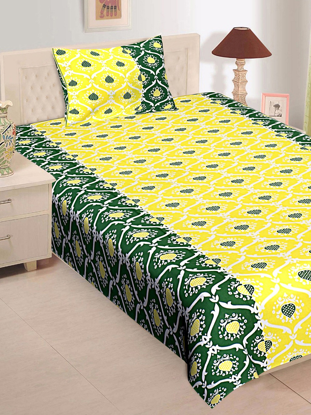 Rajasthanikart Yellow & Green Floral Cotton 120 TC Single Bedsheet with 1 Pillow Cover
Rajasthanikart Yellow & Green Floral Cotton 120 TC Single Bedsheet with 1 Pillow Cover