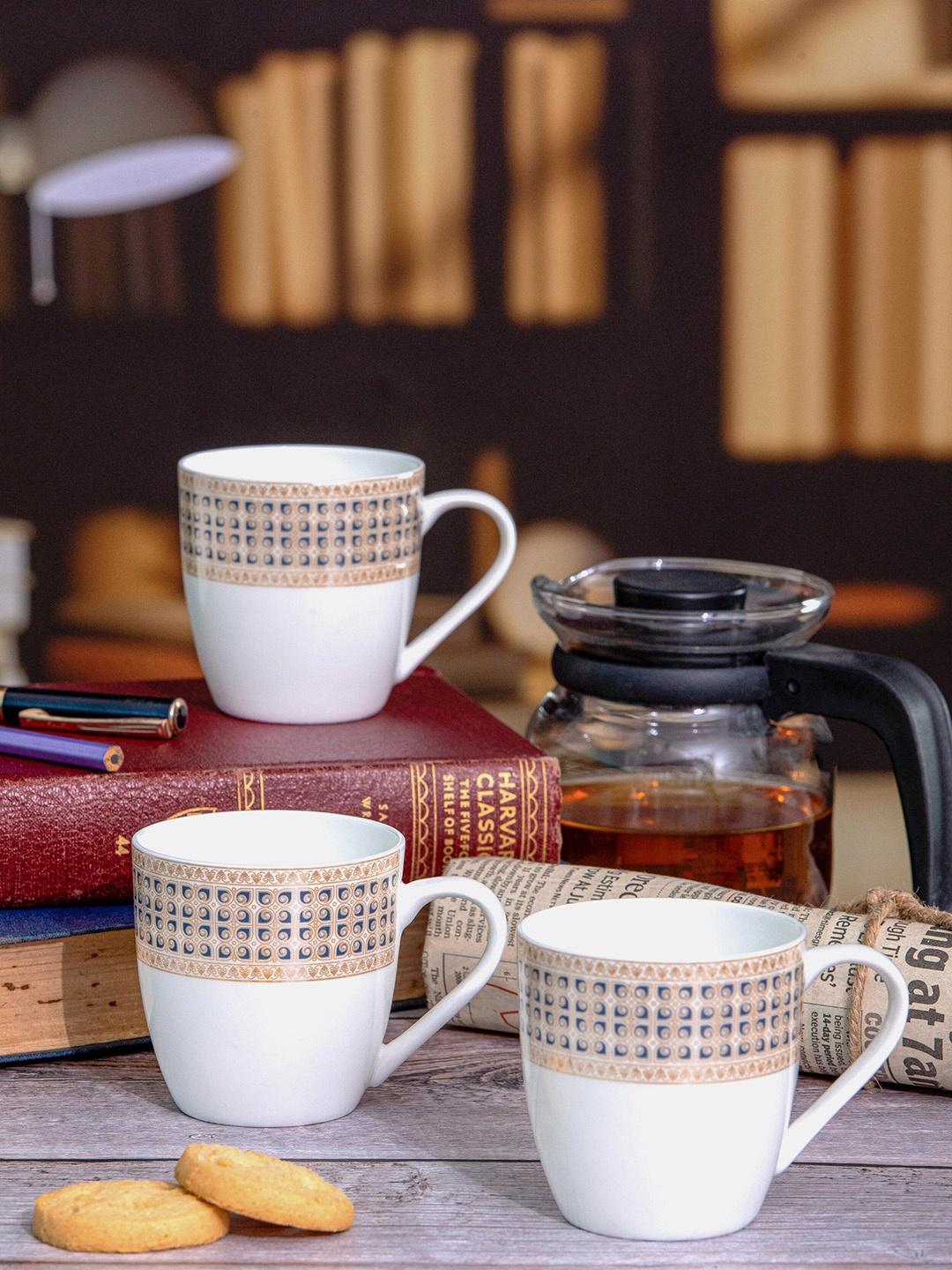 SONAKI White & Gold-Toned 6 Pcs Ethnic Motifs Printed Bone China Glossy Mugs- 180 ML Each
SONAKI White & Gold-Toned 6 Pcs Ethnic Motifs Printed Bone China Glossy Mugs- 180 ML Each