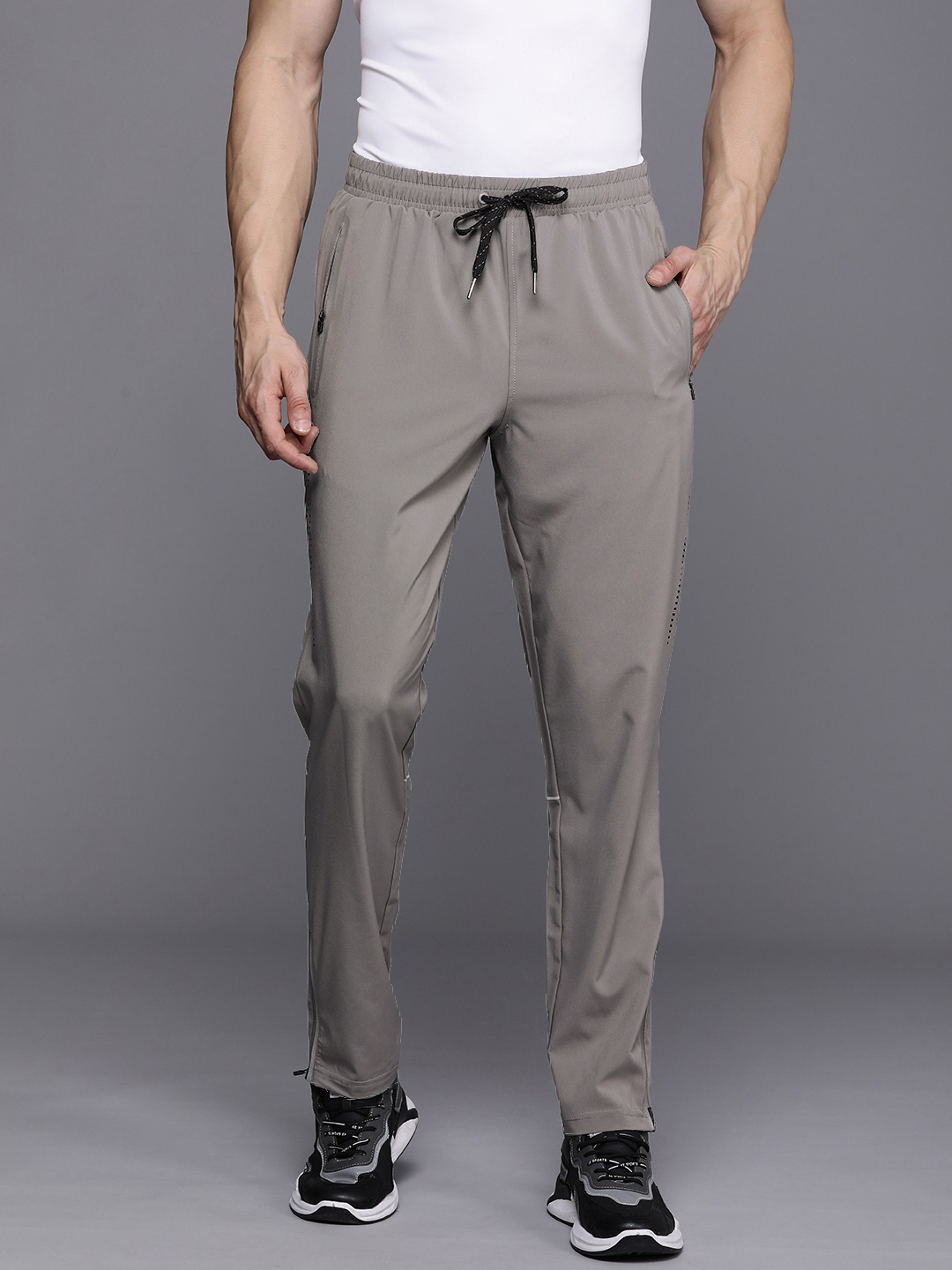 Louis Philippe ATHPLAY Men Slim Fit Mid-Rise Track Pants With Cut-Out & Reflective Strips, Grey
Louis Philippe ATHPLAY Men Slim Fit Mid-Rise Track Pants With Cut-Out & Reflective Strips, Grey