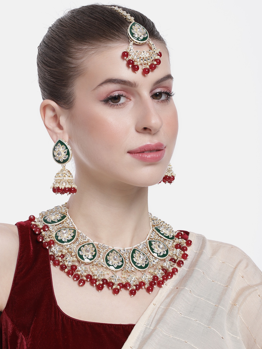 Peora Women Gold-Plated Kundan Studded Necklace with Earrings and Maangtikka, Maroon
Peora Women Gold-Plated Kundan Studded Necklace with Earrings and Maangtikka, Maroon
