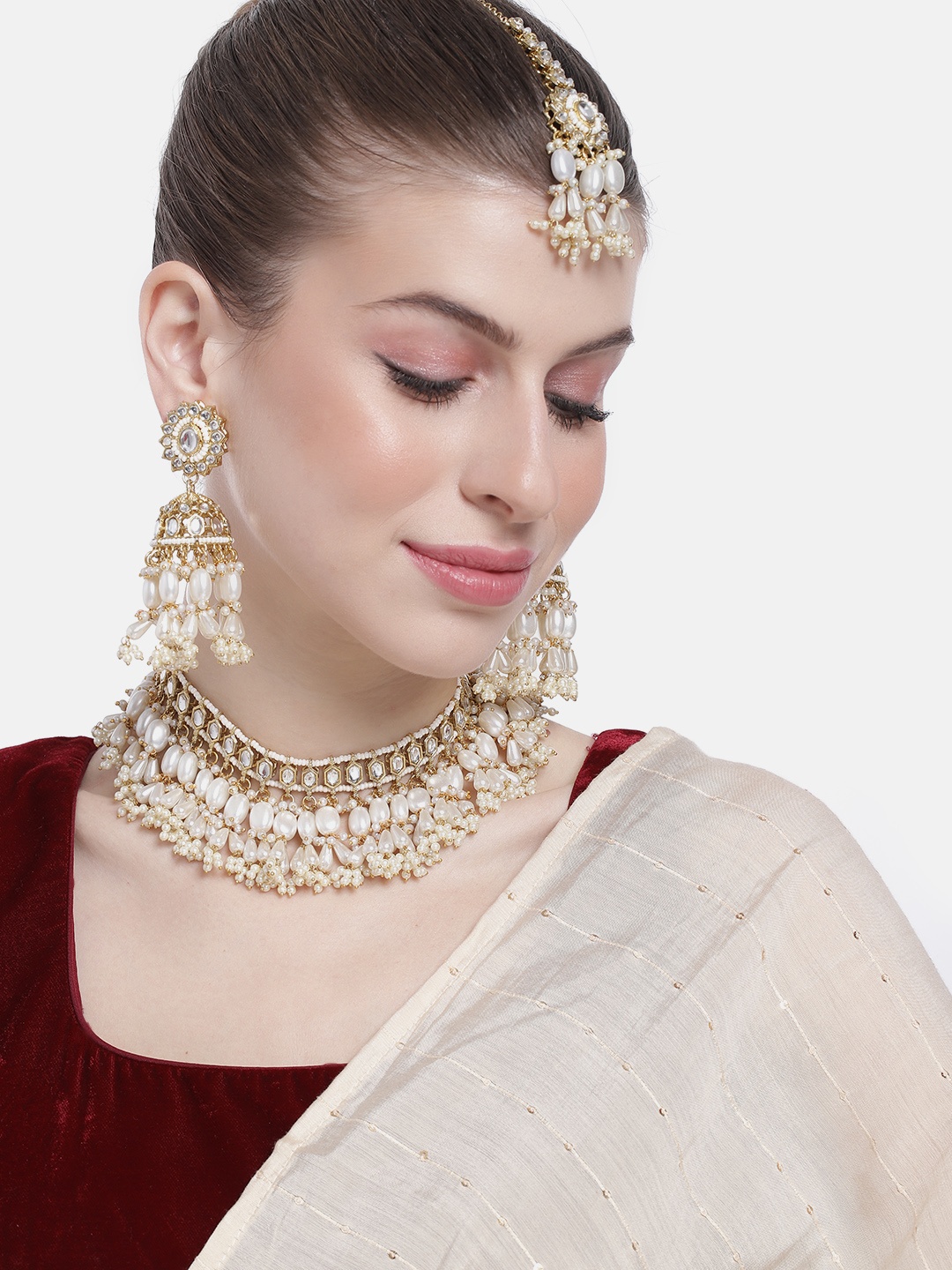 Peora Women Gold-Plated Kundan Studded Choker Necklace with Earrings and Maangtikka, White
Peora Women Gold-Plated Kundan Studded Choker Necklace with Earrings and Maangtikka, White