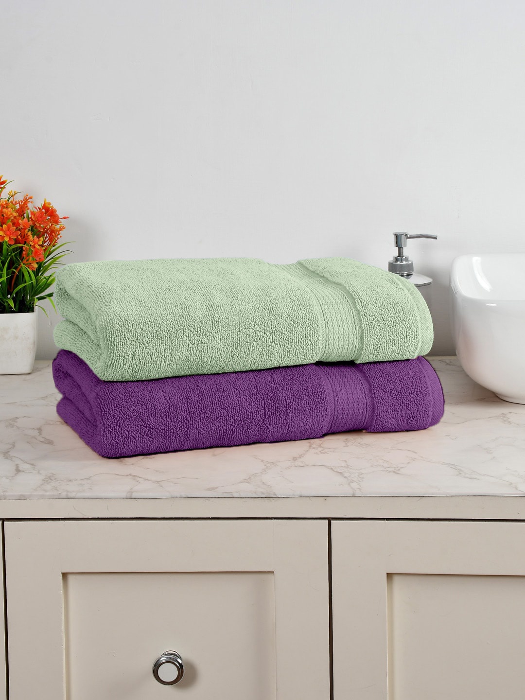 AVI Living Purple & Green 2 Pieces Cotton Anti-Bacterial 550 GSM Reversible Bath Towels
AVI Living Purple & Green 2 Pieces Cotton Anti-Bacterial 550 GSM Reversible Bath Towels