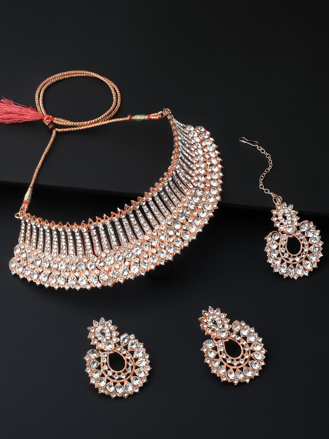Shining Diva Rose Gold Plated Crystal Diamond Studded Necklace & Earrings With Maang Tika
Shining Diva Rose Gold Plated Crystal Diamond Studded Necklace & Earrings With Maang Tika