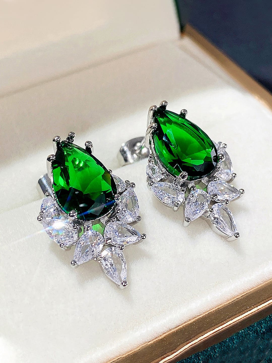 Jewels Galaxy Silver Plated American Diamond-Studded Teardrop Shaped Drop Earrings
Jewels Galaxy Silver Plated American Diamond-Studded Teardrop Shaped Drop Earrings