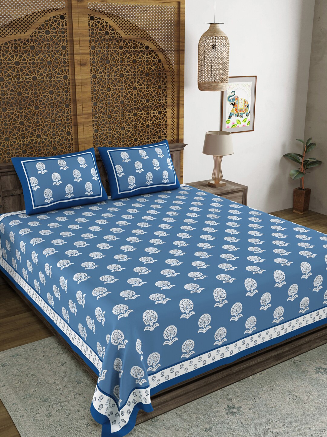 BLOCKS OF INDIA Blue Ethnic Motifs Printed Cotton 210 TC King Bedsheet & 2 Pillow Covers
BLOCKS OF INDIA Blue Ethnic Motifs Printed Cotton 210 TC King Bedsheet & 2 Pillow Covers