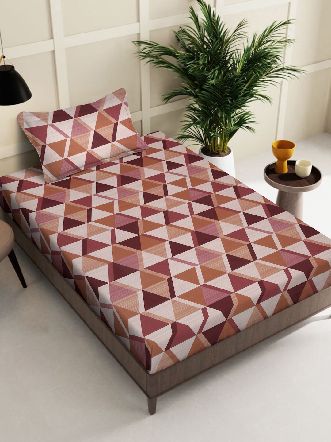 KLOTTHE Brown Geometric Pure Cotton 400 TC Cotton Fitted Single Bedsheet & 1 Pillow Cover
KLOTTHE Brown Geometric Pure Cotton 400 TC Cotton Fitted Single Bedsheet & 1 Pillow Cover