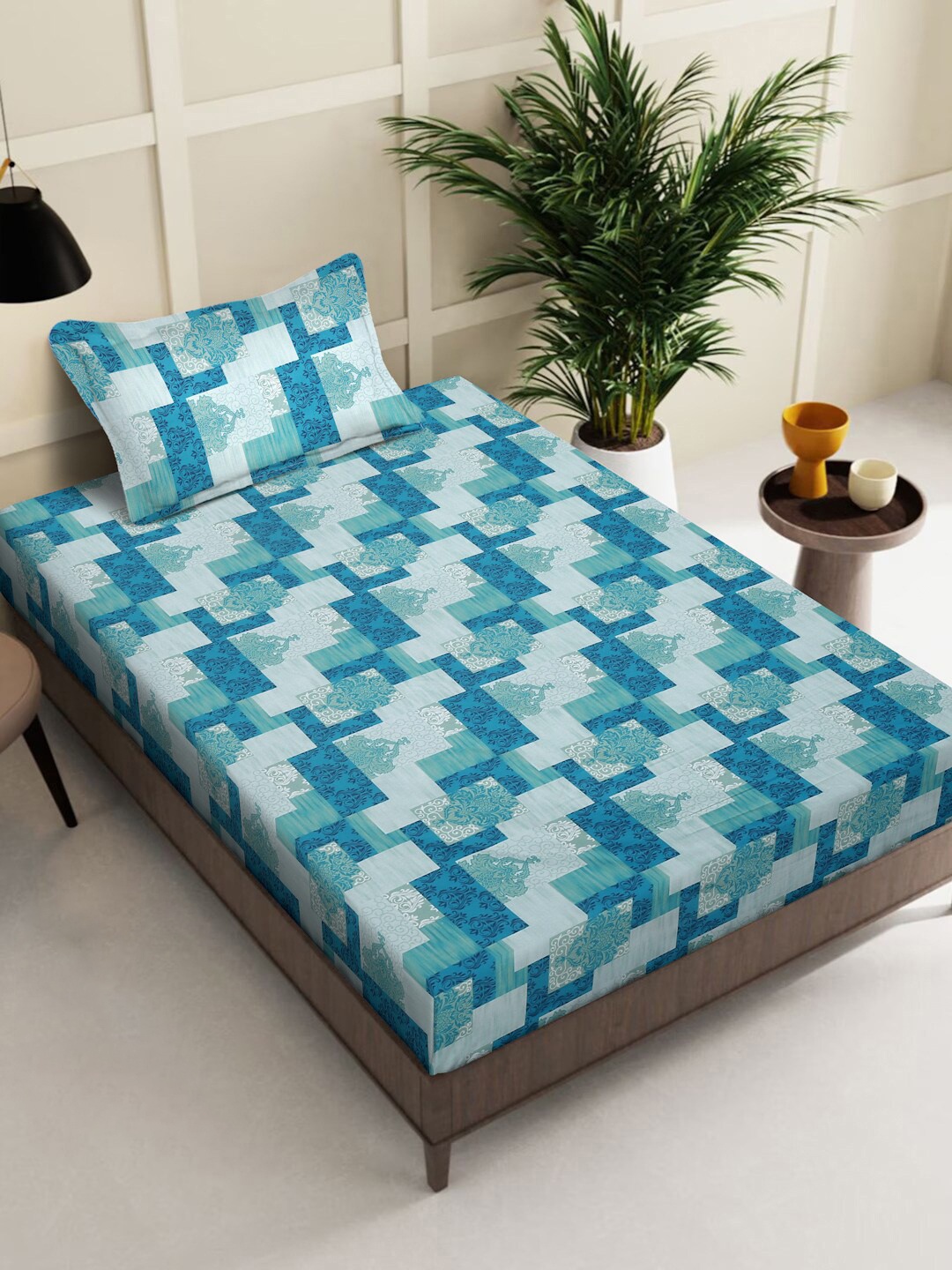 KLOTTHE Blue Geometric 400 TC Pure Cotton Fitted Single Bedsheet With 1 Pillow Cover
KLOTTHE Blue Geometric 400 TC Pure Cotton Fitted Single Bedsheet With 1 Pillow Cover