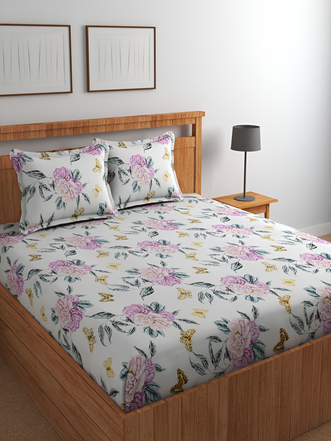 Bromwick Gulmohar White & Purple Floral Cotton 220 TC Queen Bedsheet with 2 Pillow Covers
Bromwick Gulmohar White & Purple Floral Cotton 220 TC Queen Bedsheet with 2 Pillow Covers