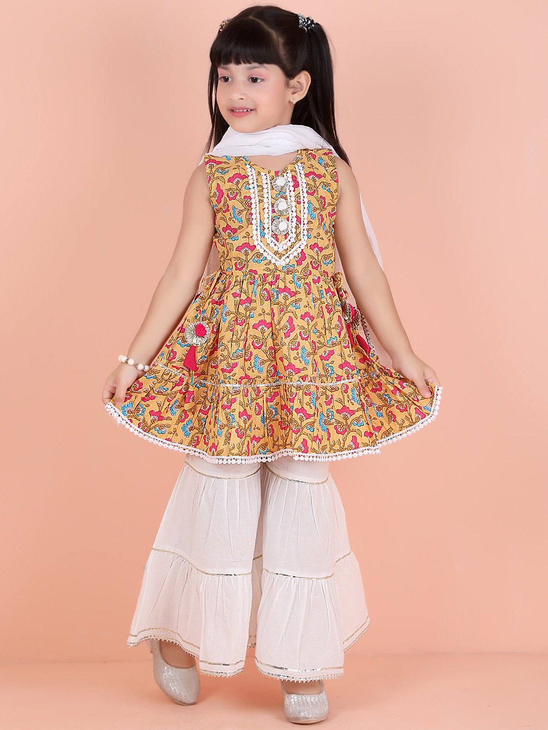 KIDS FARM Girls Floral Printed Empire Gotta Patti Pure Cotton Kurti With Sharara, Yellow 
KIDS FARM Girls Floral Printed Empire Gotta Patti Pure Cotton Kurti With Sharara, Yellow