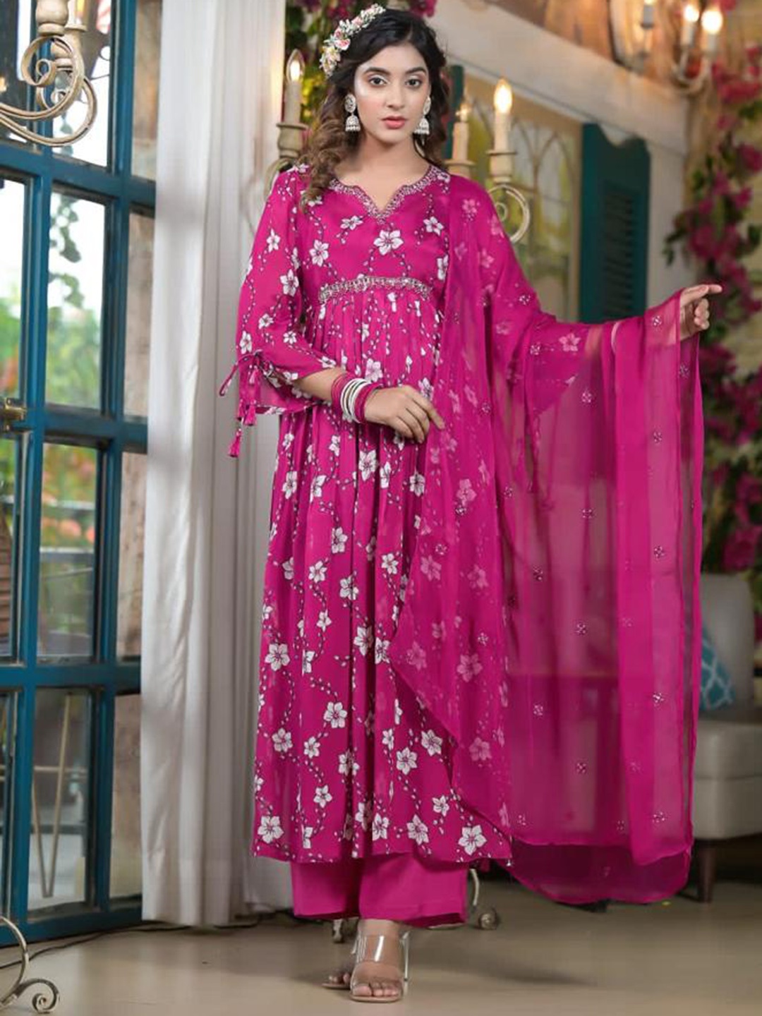 Advya Floral Printed Silk Chiffon Beads and Stones Anarkali Kurta with Trouser & Dupatta, Pink
Advya Floral Printed Silk Chiffon Beads and Stones Anarkali Kurta with Trouser & Dupatta, Pink