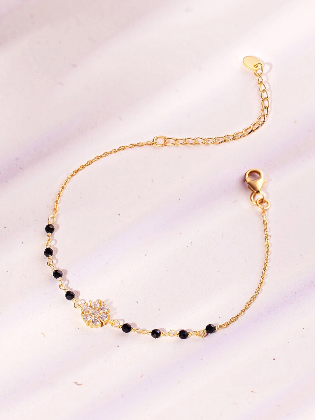March by FableStreet Sterling Silver Gold-Plated Cubic Zirconia Mangalsutra Bracelet
March by FableStreet Sterling Silver Gold-Plated Cubic Zirconia Mangalsutra Bracelet