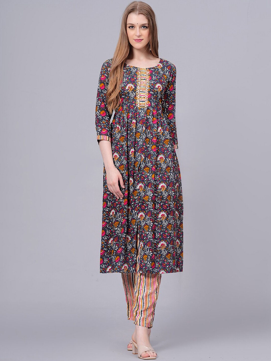 KALINI Floral Printed A-line Pleated Beads & Stones Kurta With Trouser & Dupatta, Blue
KALINI Floral Printed A-line Pleated Beads & Stones Kurta With Trouser & Dupatta, Blue