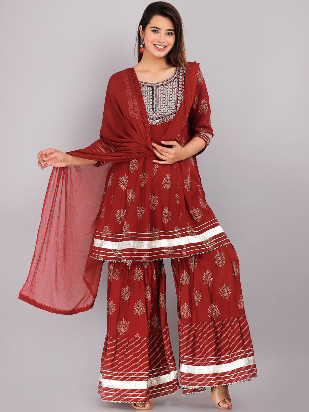 KALINI Ethnic Motifs Printed Thread Work Straight Kurta & Sharara With Dupatta, Maroon
KALINI Ethnic Motifs Printed Thread Work Straight Kurta & Sharara With Dupatta, Maroon