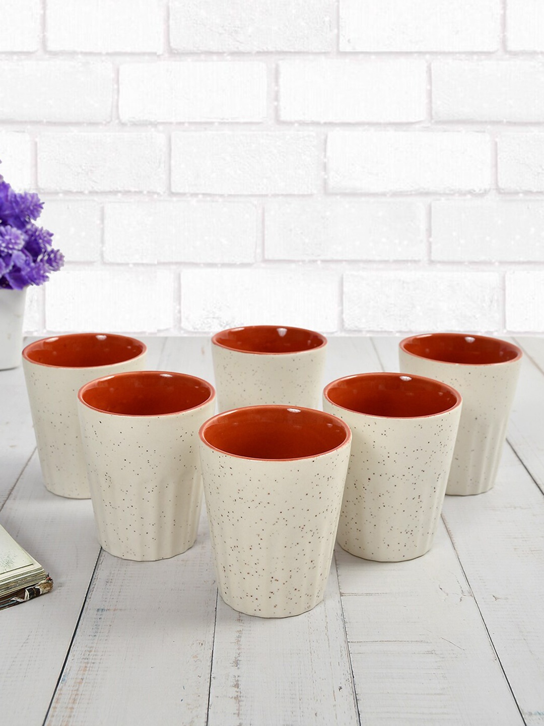 CLIO'S HERITAGE STORE Cream & Orange 6 Pieces Printed Ceramic Glossy Kulladhs 150 ml Each
CLIO'S HERITAGE STORE Cream & Orange 6 Pieces Printed Ceramic Glossy Kulladhs 150 ml Each
